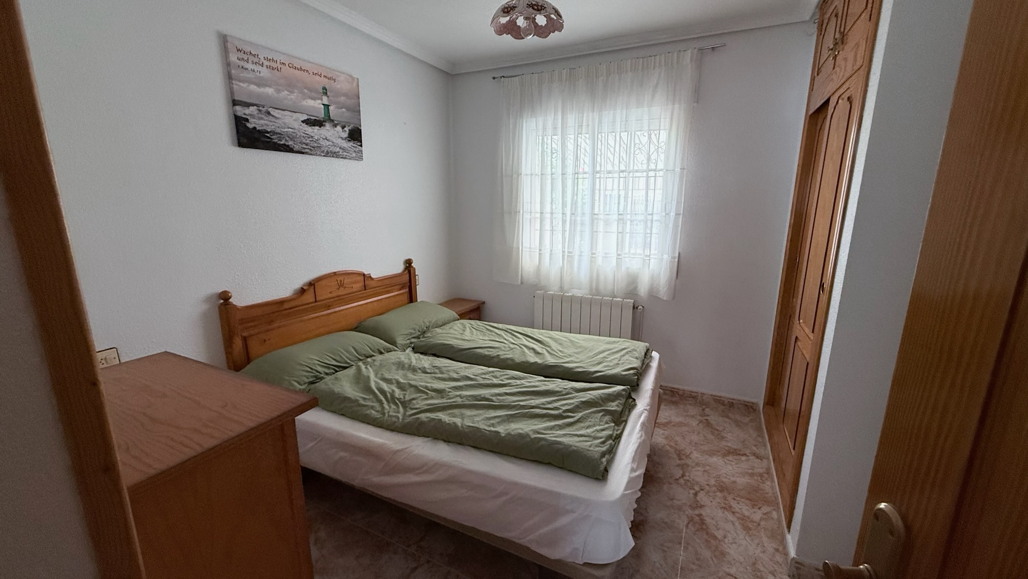 Schlafzimmer mit zwei Betten in Casa Rebekka